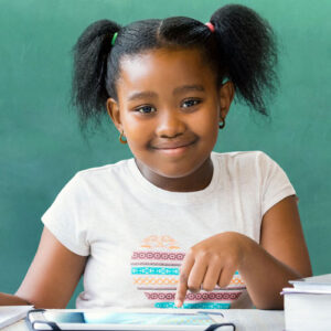 Young girl writing and pointing at tablet